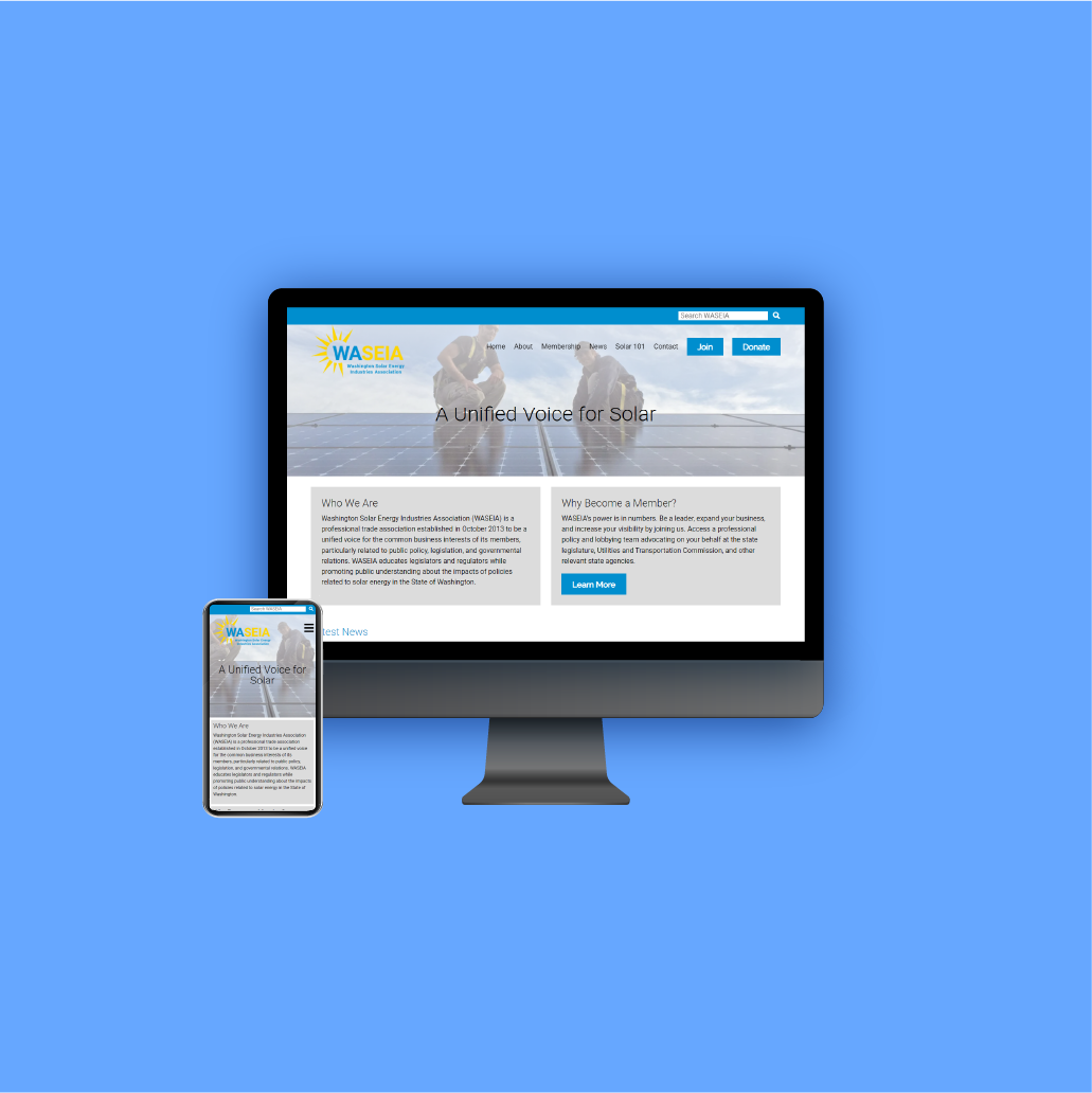 Desktop monitor and phone displaying redesigned WASEIA landing page